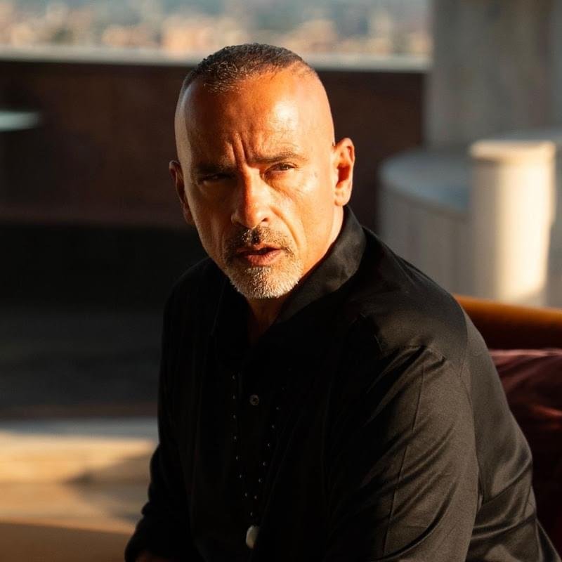 Foto di Eros Ramazzotti, artista con ruolo nel rap italiano