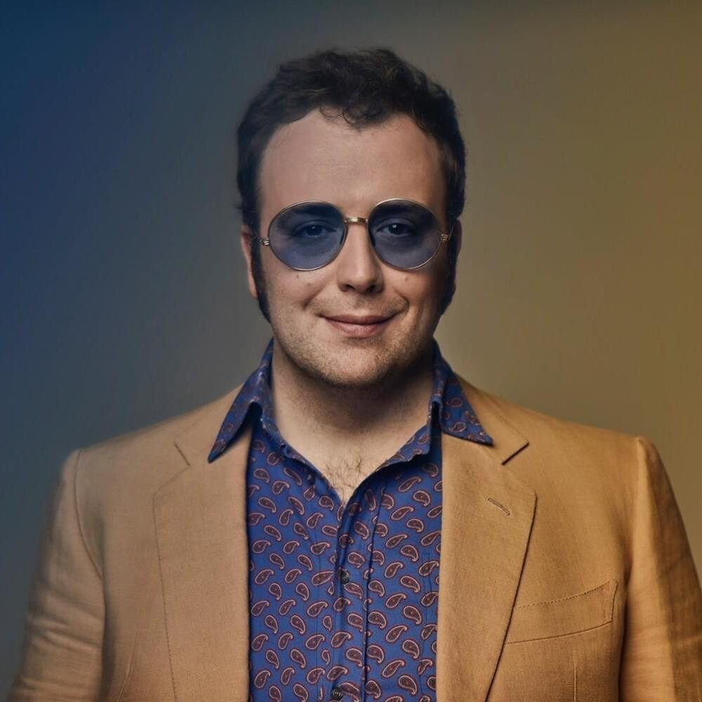 Foto di Raphael Gualazzi, artista con ruolo nel rap italiano