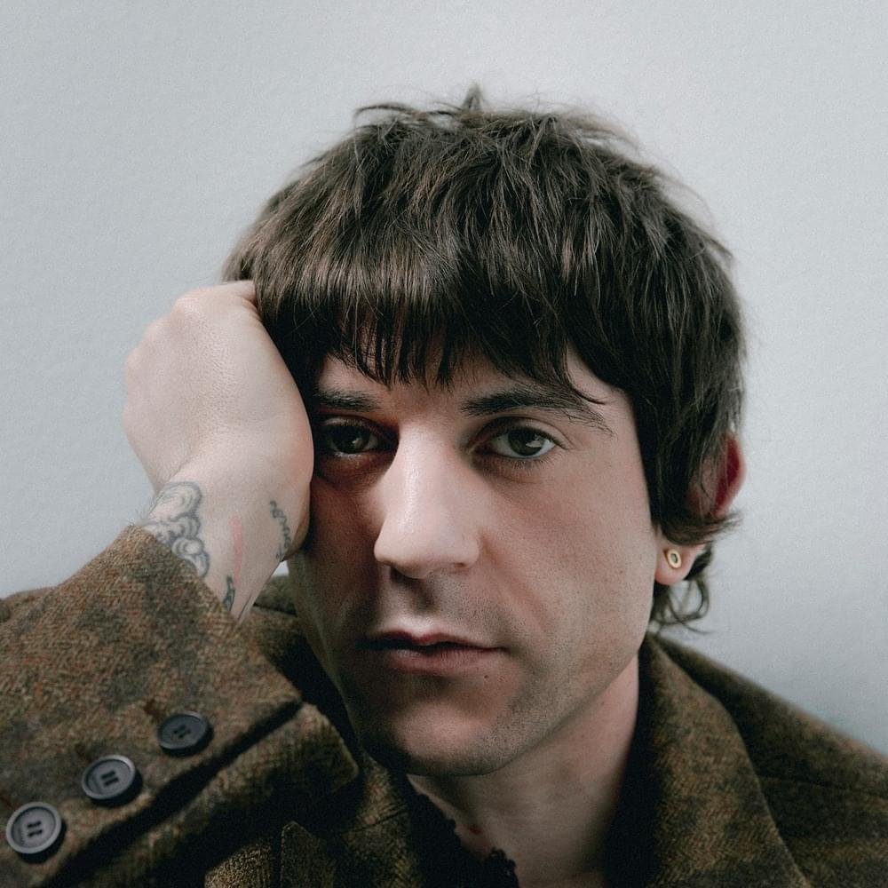 Foto di Rkomi, artista con ruolo nel rap italiano